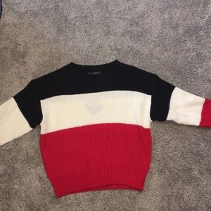 Black, white and red sweater